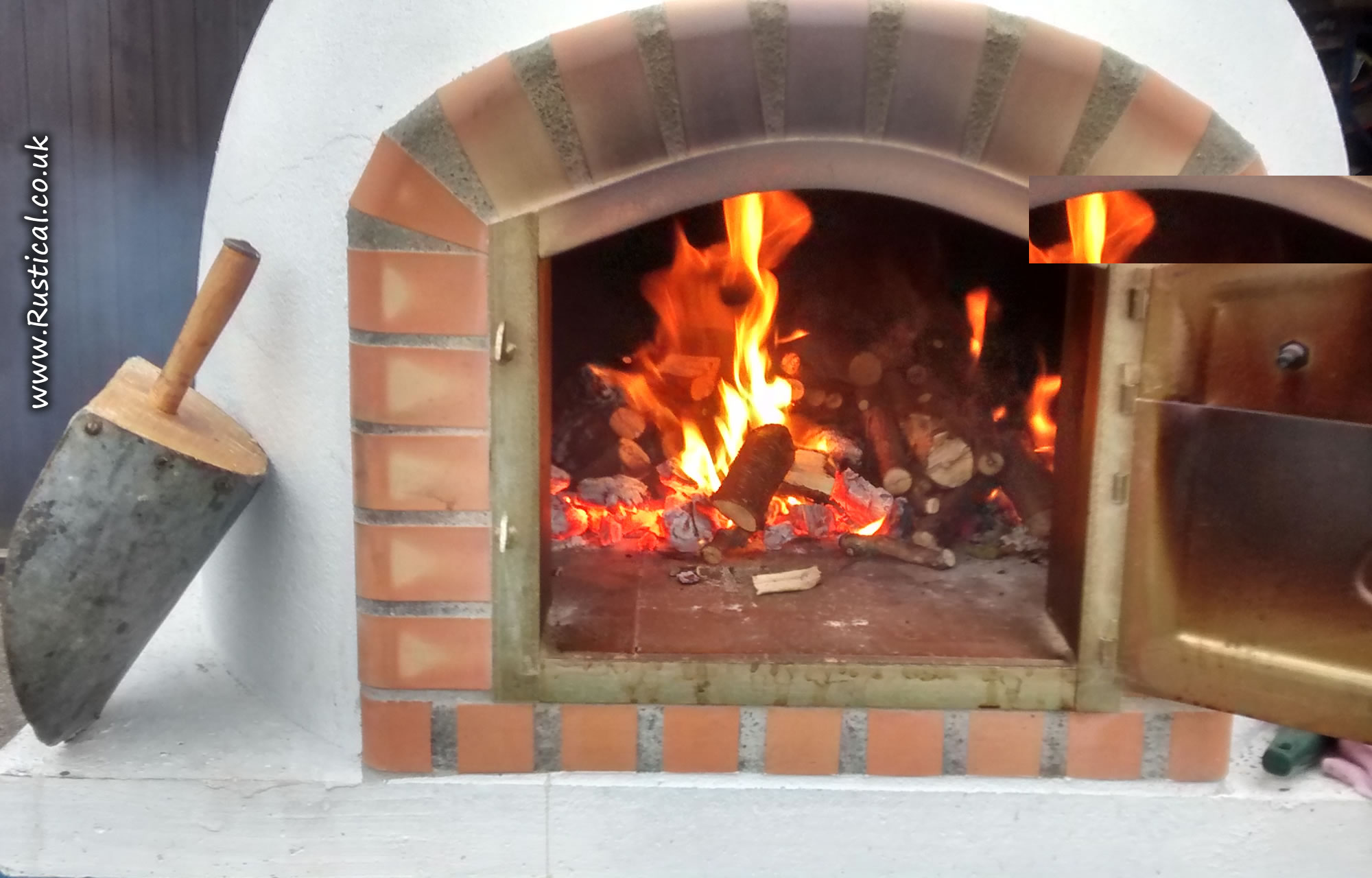 Our pizza oven loaded with wood chunks