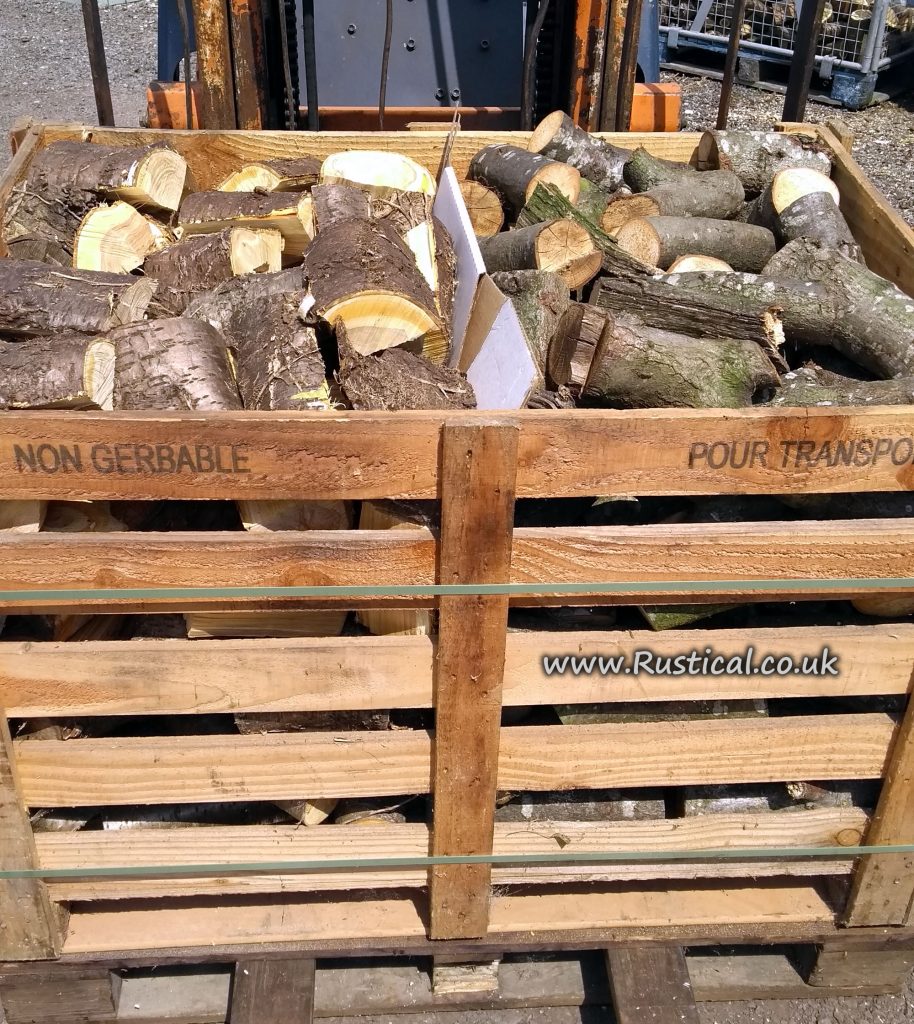 A split crate of Cherry and Oak logs